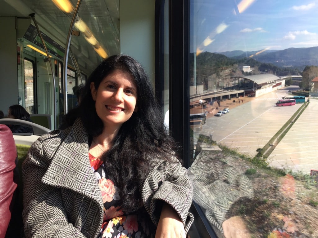 Anisa on the train, ready to head up. - "Montserrat: Mountain, Monastery, and Wine" - Two Traveling Texans