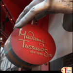 entrance to madame tussauds in New York with text overlay "is madame tussauds in NYC worth it?