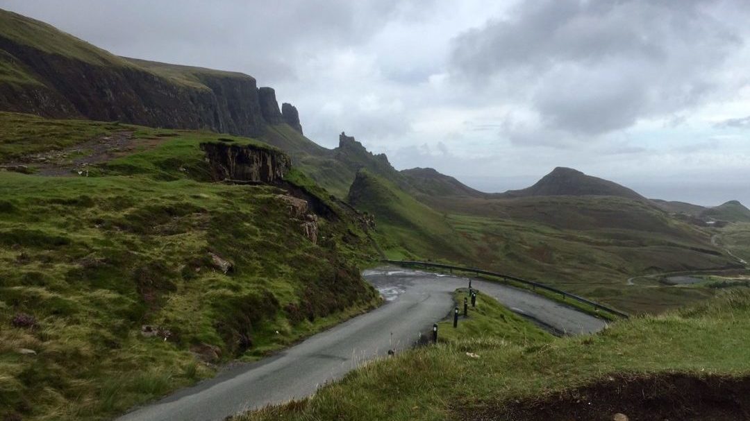 One of the many curvy narrow two-way roads on Isle of Skye. "UK vs US: Road Trip Comparison" - Two Traveling Texans