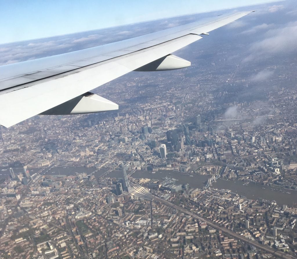 I was able to get some great aerial shots of London thanks to my window seat and a clear day! - "Neck Support Pillow and Other Travel Sleeping Tips" - Two Traveling Texans