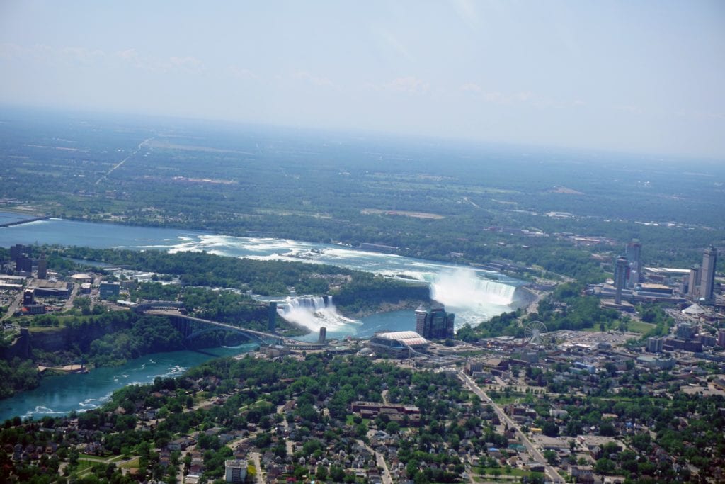 Here you can see the Rainbow Bridge, the American Falls, the Bridal Falls, and the Horseshoe Falls. - "Niagara Falls Helicopter Ride to Remember" - Two Traveling Texans