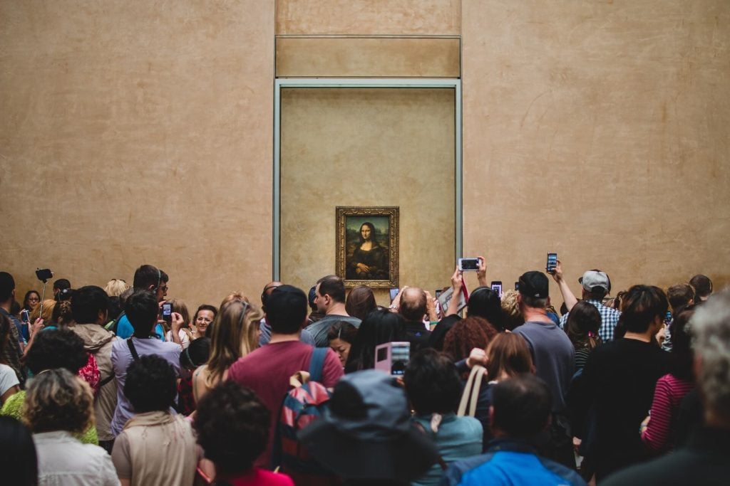 The Mona Lisa is popular! - Top Tips for Visiting the Louvre - Two Traveling Texans