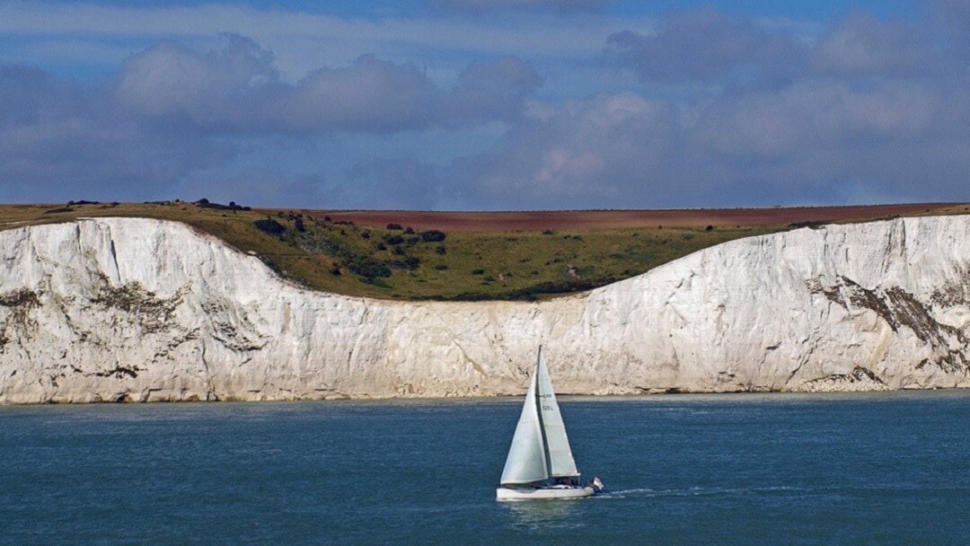 Sailboat and the Dover Cliffs - Dover Cliffs Guide - Two Traveling Texans