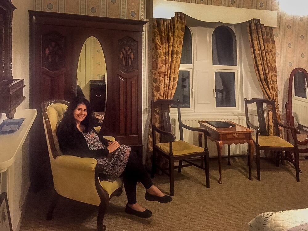 Anisa relaxing in her room at the Carriglea House by Killarney National Park.