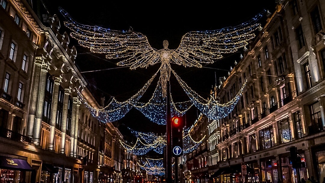 christmas angel lights on regent street in london during the winter