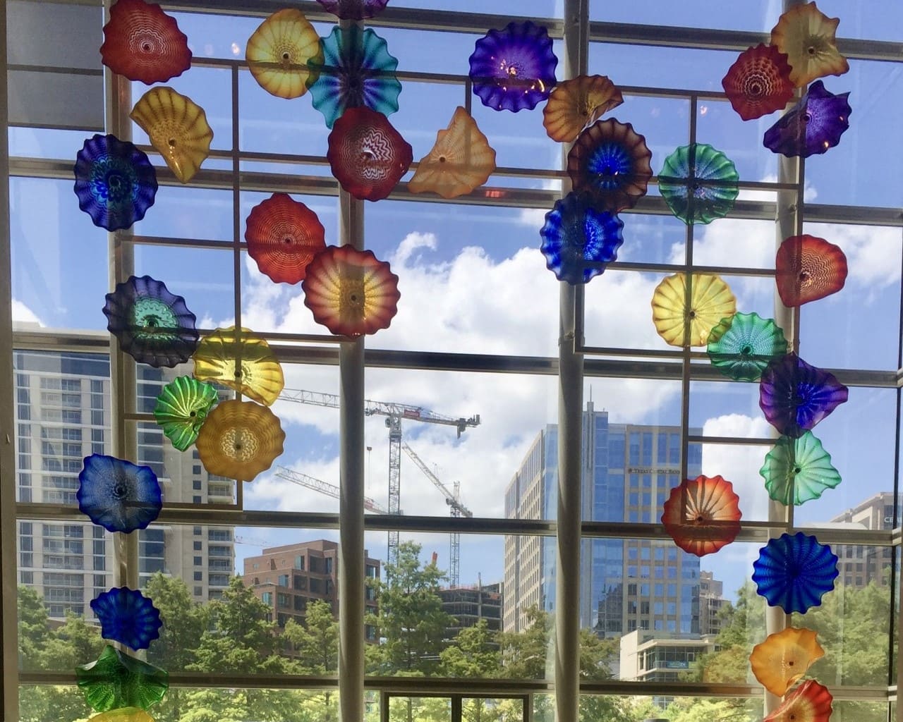 The Dallas Museum of Art has colorful glass artwork in the cafe.