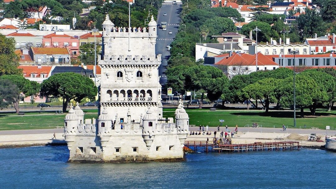 view of belem tower with landscape behind it