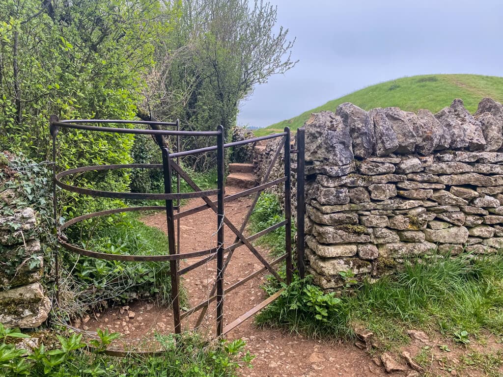 kissing gate connected to dry stone wall