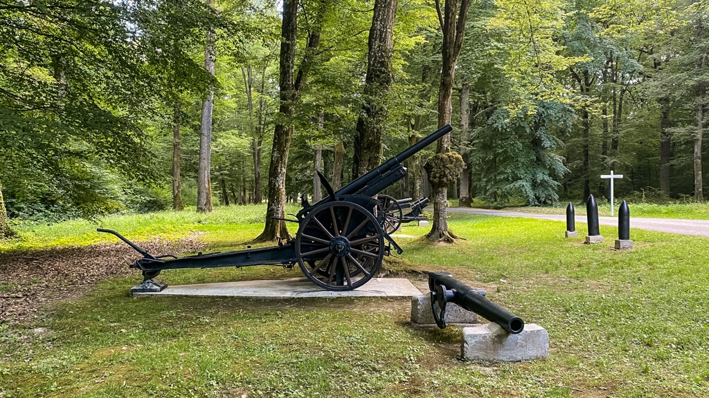 cannon and bombs on display in Belleau Wood near the Marine Monument