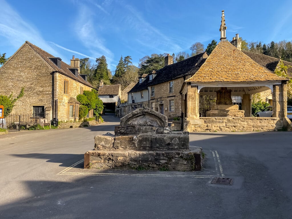 market cross in the center of castle combe village