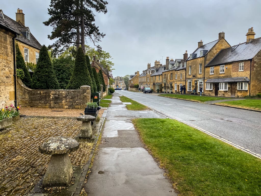 high street lined with typical cotswolds buildings