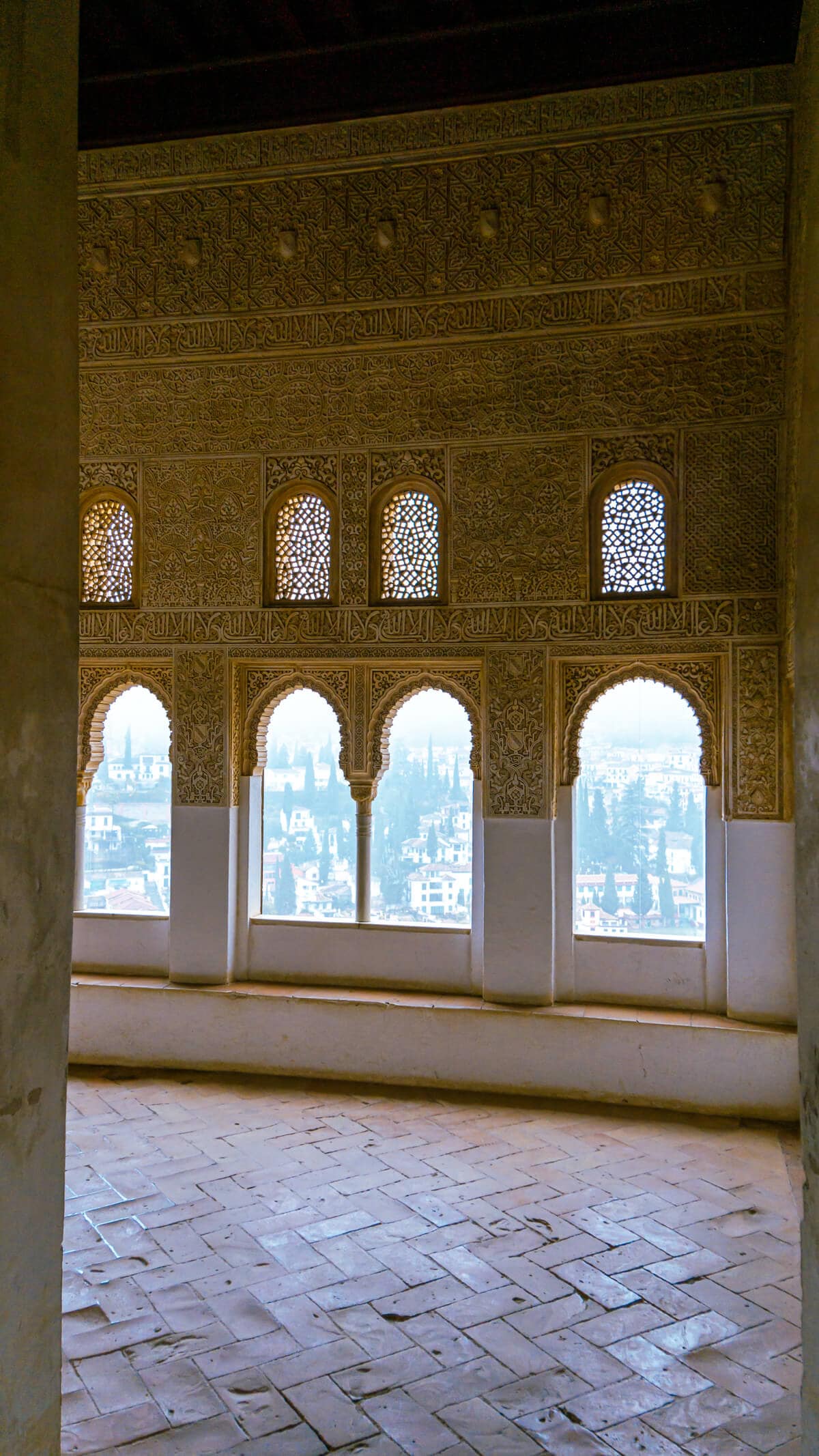 arabic style windows and decor inside the nasrid palaces